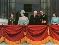 Elizabeth on the balcony of Buckingham Palace with her family and Winston Churchill on 8 May 1945, Victory in Europe Day