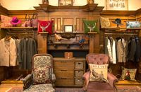 The original fireplace in the ladies&rsquo; room surrounded by the collection